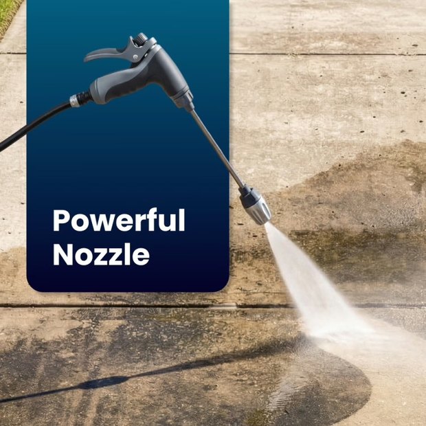 Jetterix nozzle attached to a garden hose, spraying a concrete driveway